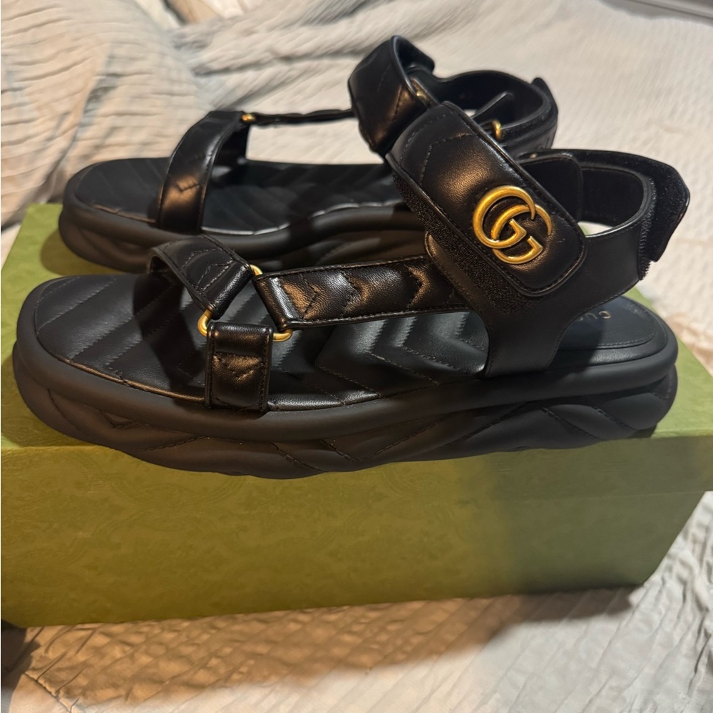 Gucci Black Sandals with Gold Accents